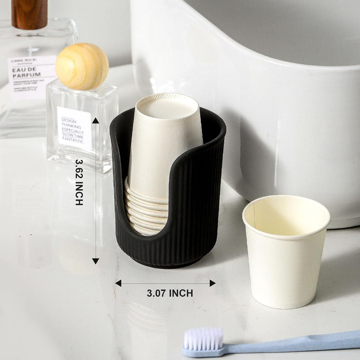 Dobbyby Ceramic Bathroom Cup Dispenser with Stylish Vertical Stripes - Disposable Mouthwash Cup Holder Holds 3-4oz Paper Cups for Rinsing Cups on Bathroom Vanity Countertops (Matte Black)